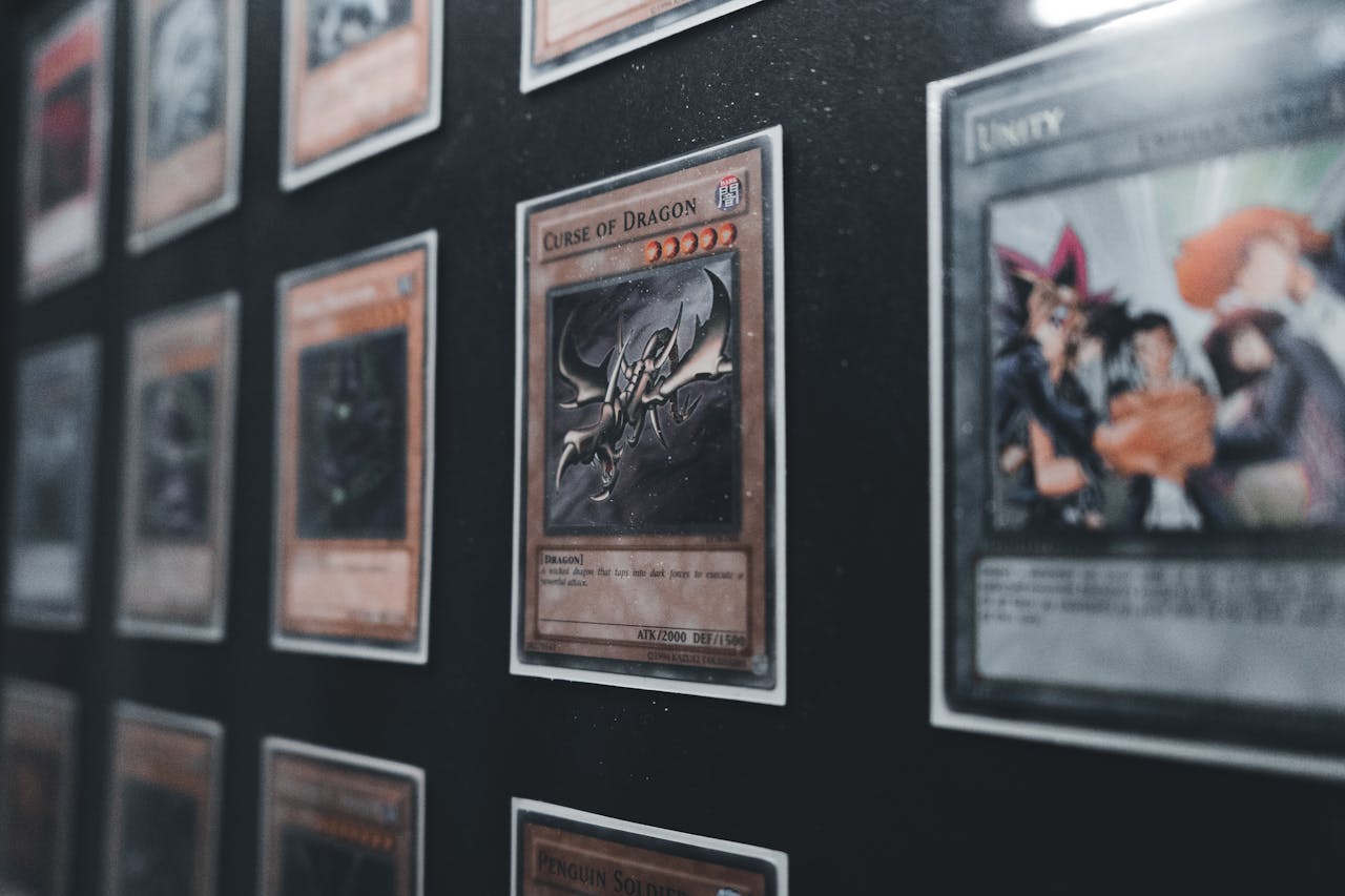 Crafting Captivating Headlines: Your awesome post title goes here A close-up view of Yu-Gi-Oh! trading cards in a display case showcasing rare and collectible cards.